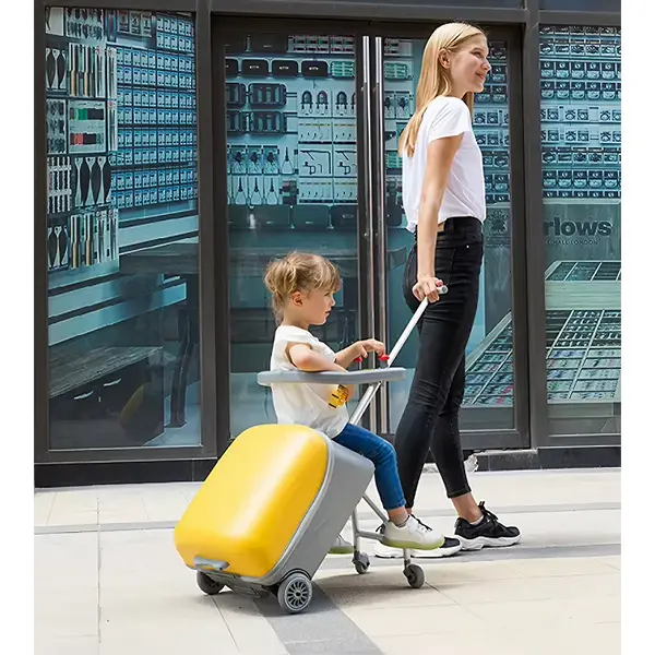 The children sit on Jingxiang's Kids Luggage Trolley. The trolley is equipped with a 4-wheel suitcase, which parents can easily drag in front, greatly reducing the burden of travel.